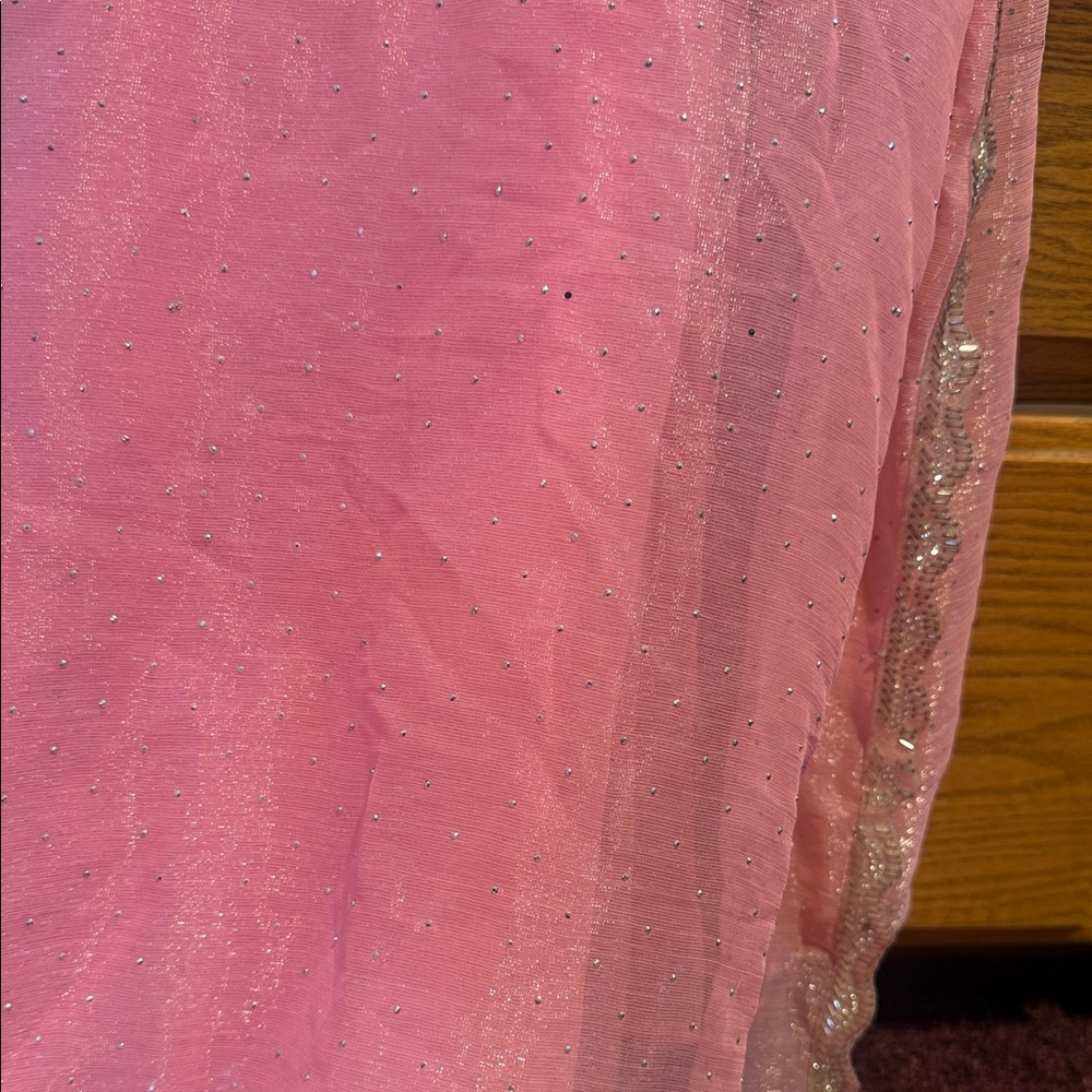 Pink Glittery net sari with Silver Accents